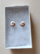 Load image into Gallery viewer, Gold and white swirl earrings inside a white paper jewelry box
